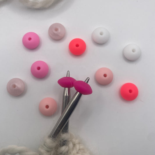 Pink oval needle protectors Set of 2